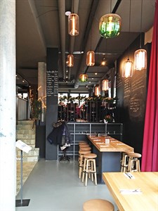 Momo Restaurant in Germany, where Italian flavours are served in a modern, industrial-style location